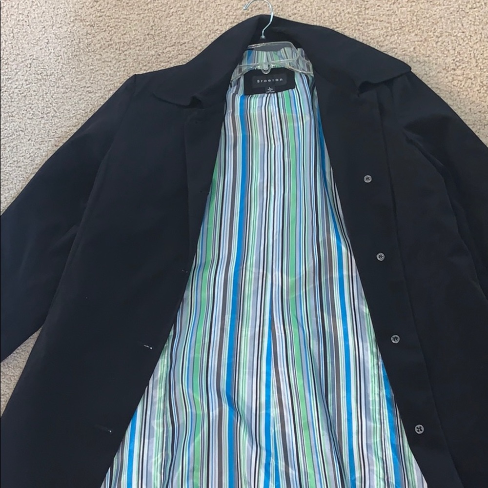 Black and striped rain jacket